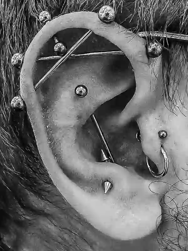 Industrials Antritragus, Vertical Helix, Flat, Double Tragus Piercing