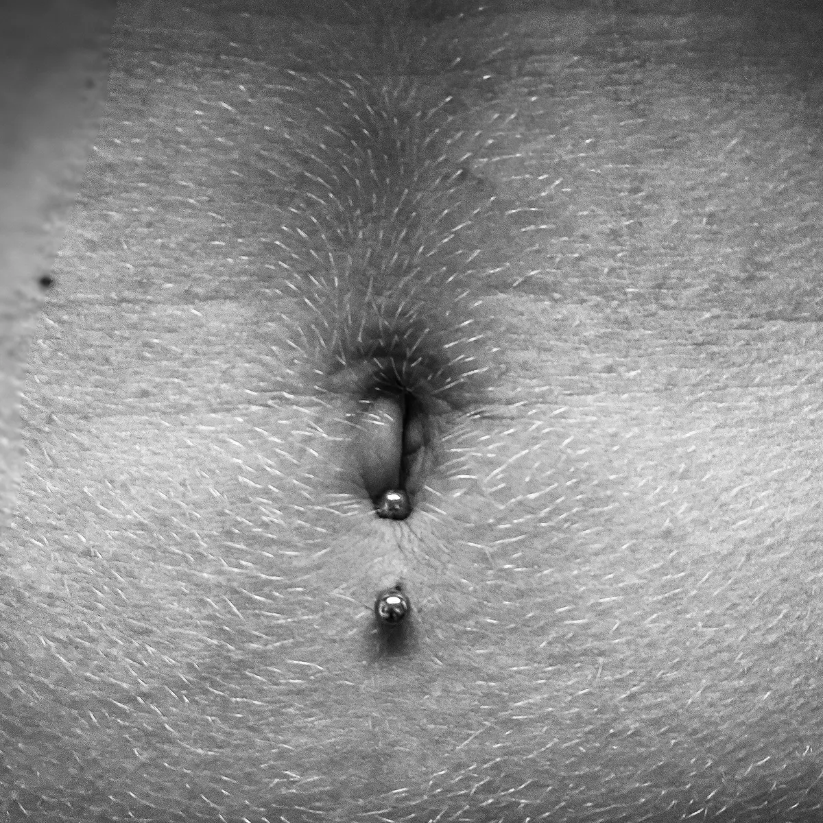 Unteres Bauchnabel Piercing