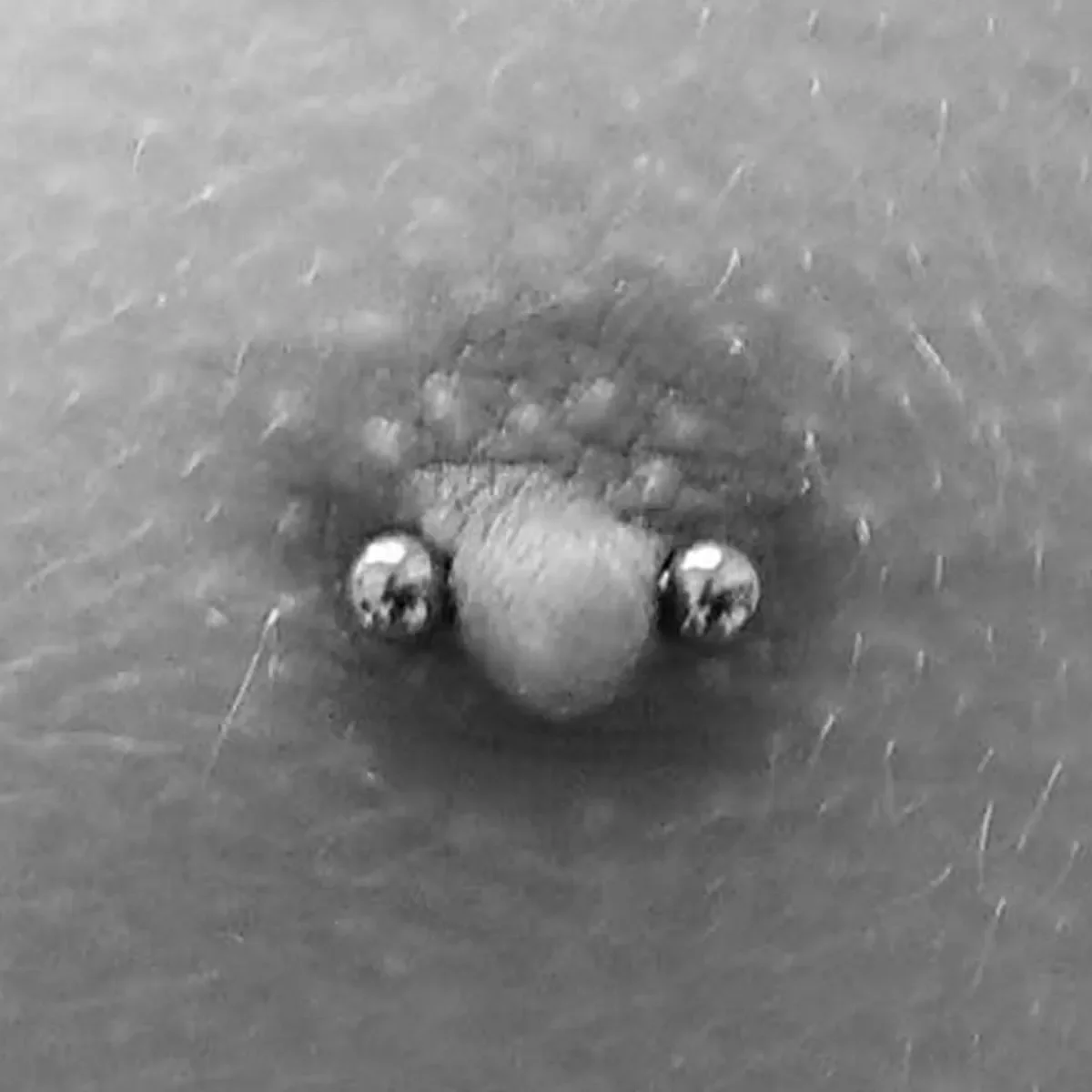 Brustwarzen Piercing